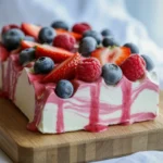 frozen yogurt bark with summer berries on cutting board