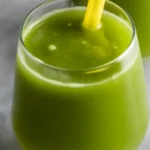 Healthy green juice for weight loss with kale, spinach, cucumber, and ginger.
