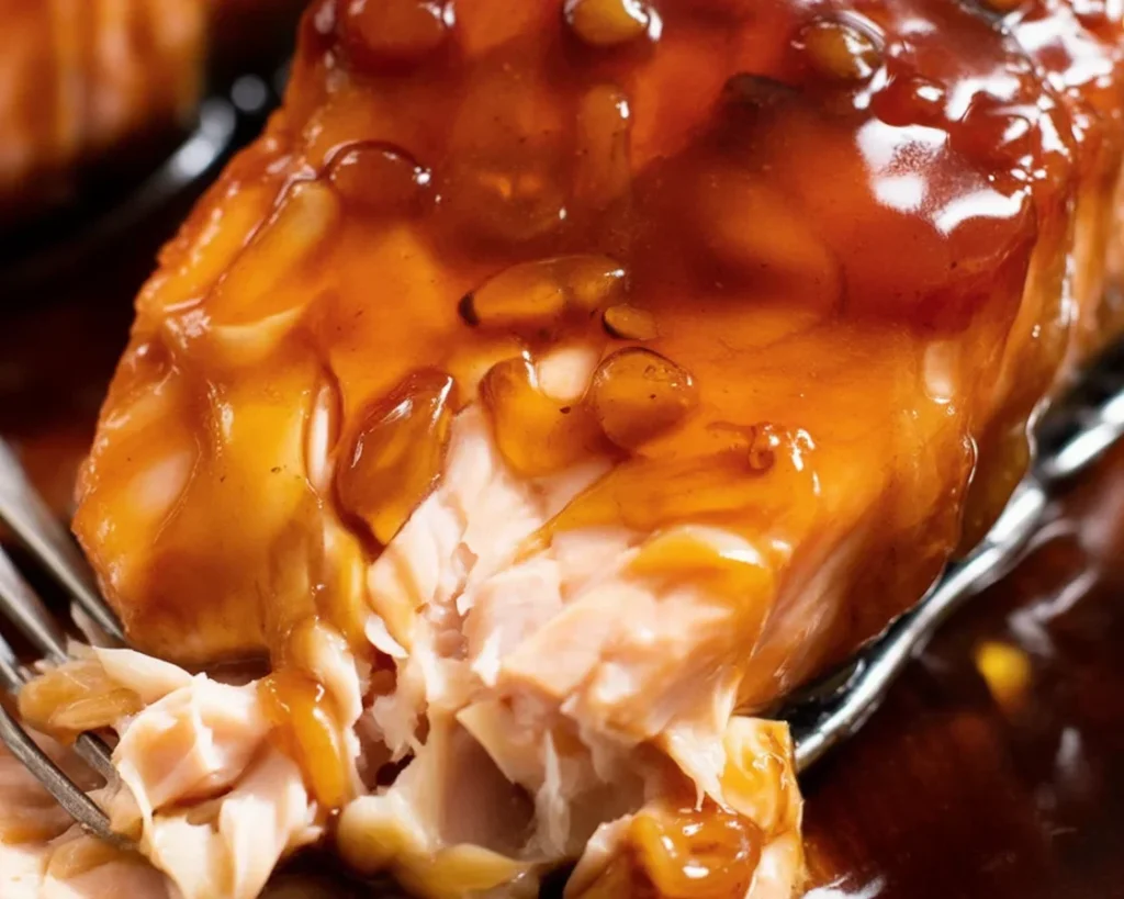 Honey Garlic Glazed Salmon served with rice and salad