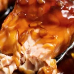 Honey Garlic Glazed Salmon served with rice and salad