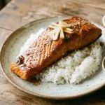 Honey Soy Glazed Salmon fillets cooked and plated with garnish